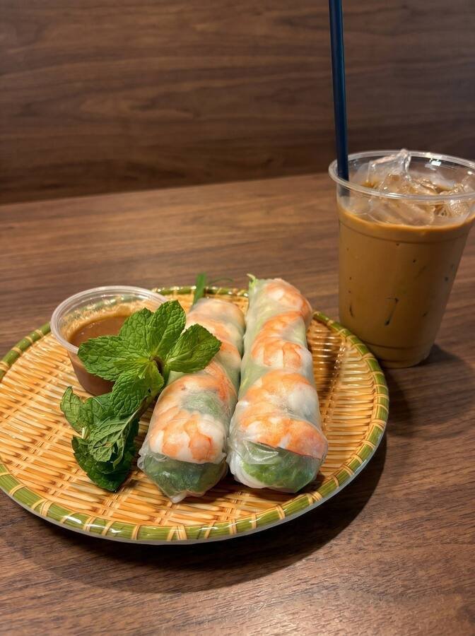 Fresh summer rolls with shrimp, herbs, and peanut sauce