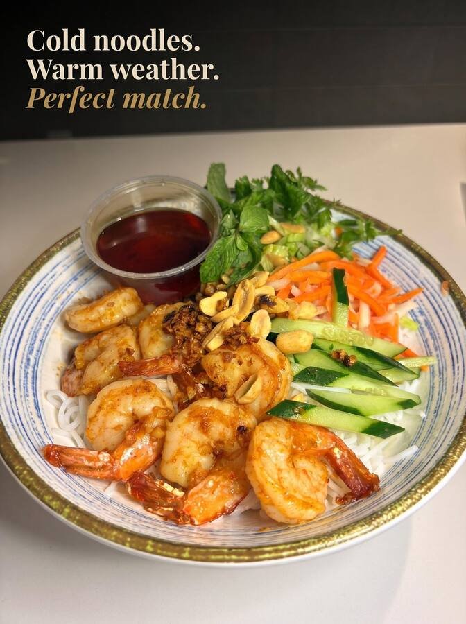 Vermicelli bowl with shrimp, herbs, and pickled vegetables